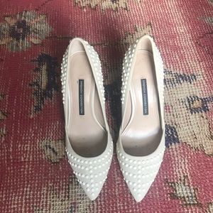 Ivory pumps